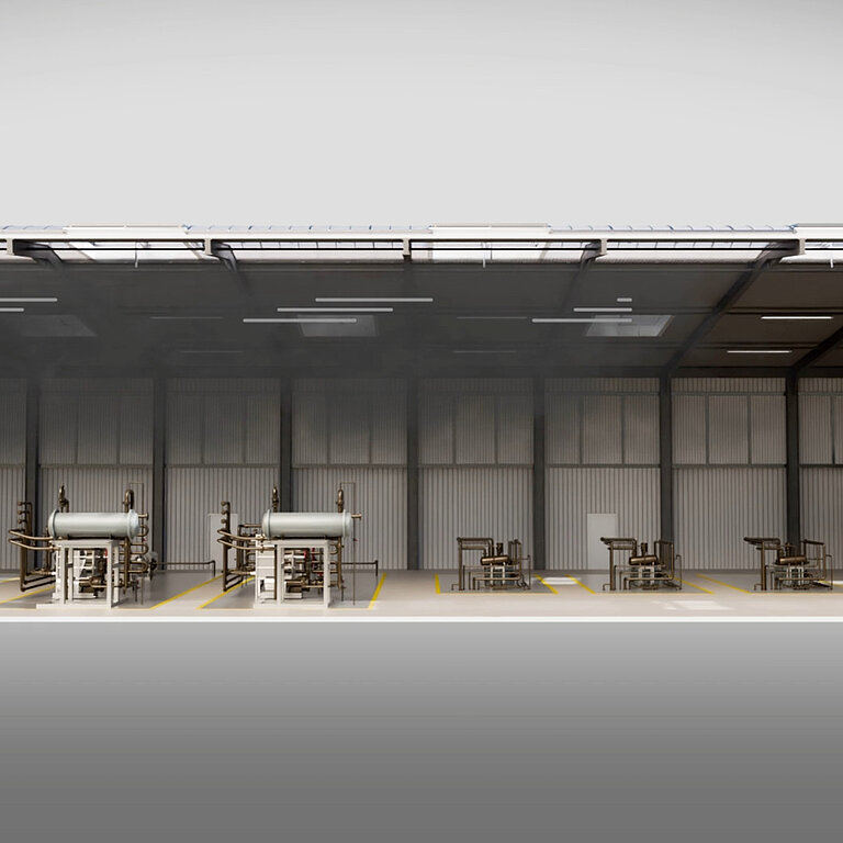 Große Industriehalle mit Arbeitsbereichen und Maschinen, gleichmäßig belichtet durch Dachoberlichter entlang der Hallendecke